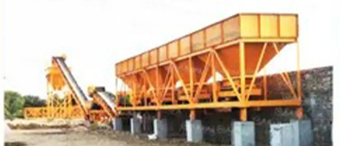 Everything-you-need-to-know-about-Wet-Mix-Macadam-Plants-big a yellow and white vehicle with a white door